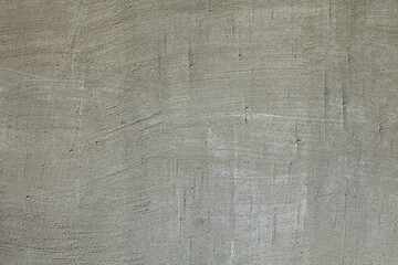 Grey wall, texture, background. Gray multi-layered wall covering. Rough, uneven surface. Cement...