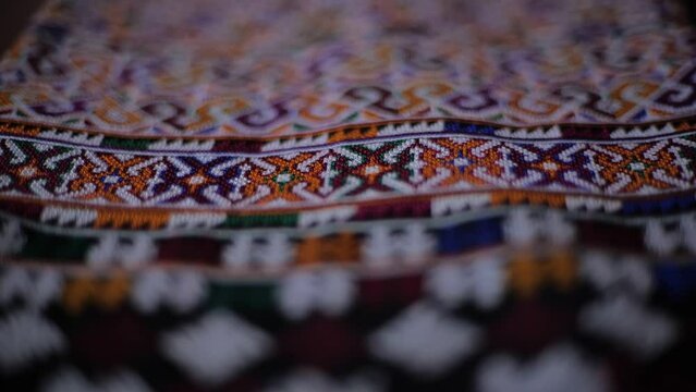 The culture and traditions of the lu mien ethnic group are reflected in their traditional clothing, which features unique decorations and creative textile patterns specific to their tribe.Thailand2023