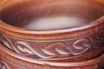 unglazed earthenware with a pattern close up. Traditional ukrainian pottery