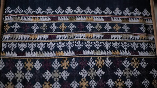 The culture and traditions of the lu mien ethnic group are reflected in their traditional clothing, which features unique decorations and creative textile patterns specific to their tribe.Thailand2023