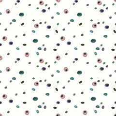 A very simple pattern with sea pebbles scattered on a white background.
