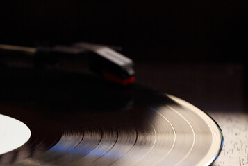 vinyl record with clear sound tracks and stylus, focus on sound tracks records, old style, classic...