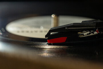 gramophone needle close-up, vinyl record with clear sound tracks and stylus, music concept  © Point of view