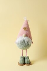 Сhristmas gnome on a colored background