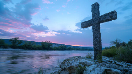 A Christian cross on a rocky island in a river, with the early evening light softening and the sky behind turning a gentle pink and blue, creating a peaceful end-of-day scene.