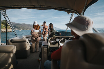 A group of friends share a joyful moment on a boat, enjoying beers and the beauty of a tranquil...