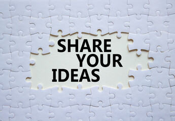 Share your Ideas symbol. Concept words Share your Ideas on white puzzle. Beautiful white...