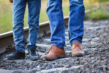 feet father and son cowboy shoes