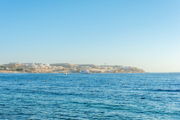 Fototapeta premium Beautiful view of Red sea surface. Natural background with sunny day sky.