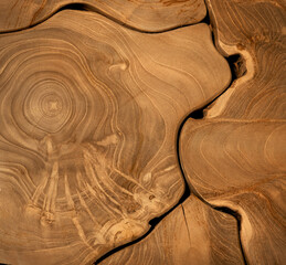 Wood working pieces of natural slab edge fit together for a background design