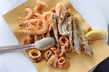Fried calamari, prawns and small fish, a typical dish of Italian cuisine