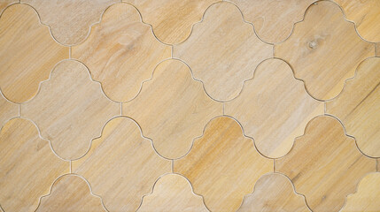 Shabby chic tile design made of wood tiles in a geometric pattern on a floor or wall