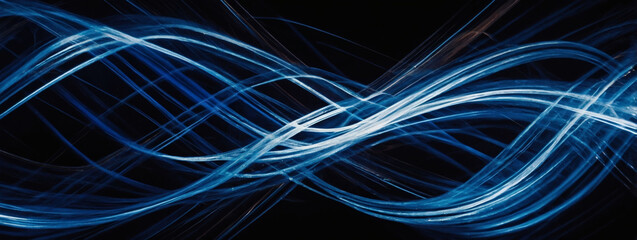 Vivid cobalt motion trails with shimmering highlights, contrasting with black space.