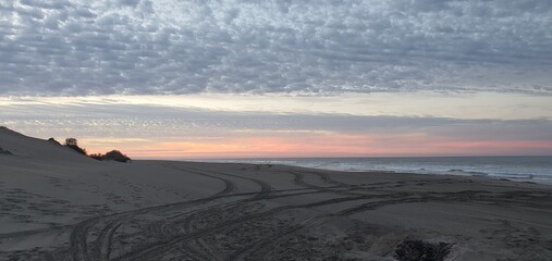 Sunset Over Beach with Tire Tracks © Conoce mi México