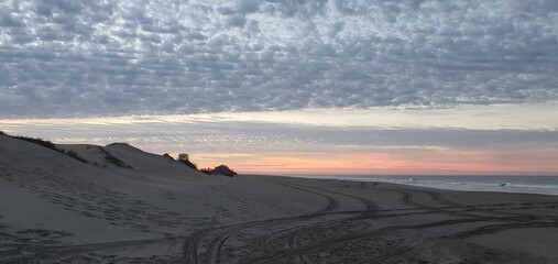 Serene Evening at the Beach with Tire Tracks © Conoce mi México