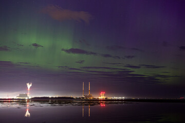 Northern lights / aurora over Dublin Poolbeg chimneys in Ireland