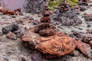 Fototapeta premium Osorno volcano mountain summit in Chile, Patagonia Andes. The ring of fire volcanic landscape with crater and lava active volcano in South America. Red rock frozen lava and snow on volcano top