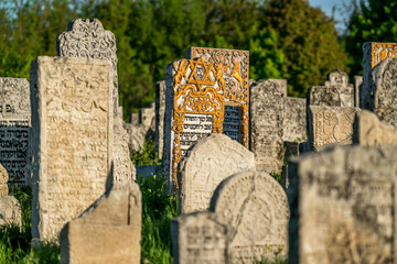 Old Jewish cemetery with partially renovated tombstones