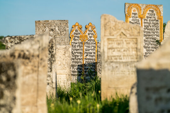 Old Jewish cemetery with partially renovated tombstones