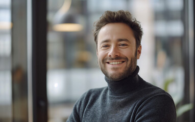 Obraz premium Confident smiling man in office