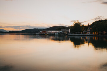 Shot of several boats in water at sunset