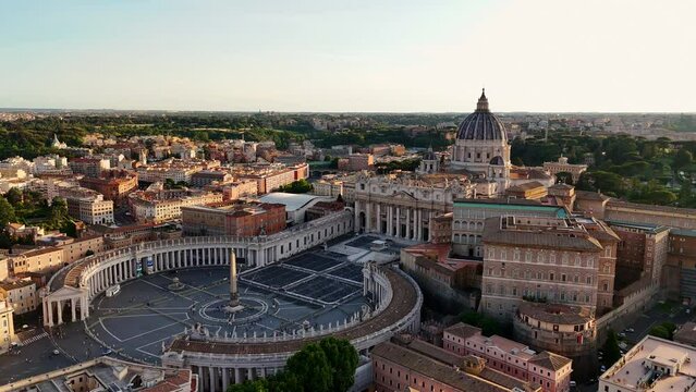 Aerial shot of the dwarf Vatican City state in Rome, Italy. Drone view of St. Peter's Square in Vatican City at sunset