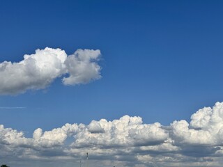 Fototapeta premium Large Fluffy Clouds in Sky