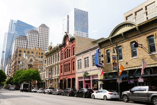Austin, Texas, U.S - April 9, 2024 - The variety of restaurants and sports bars on East 6th Street in the downtown area