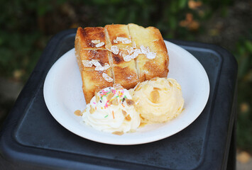 Toast with ice cream on a plate