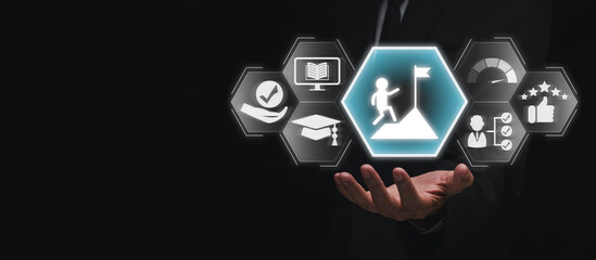 Apprenticeship concept, Businessman hand holding Apprenticeship icon on virtual screen.