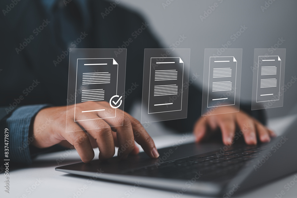 Poster document management concept, businessman using laptop with online quality assurance approval documen