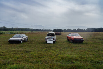 Classic 1980s carsfor sale on a farm Gerladine, Canterbury, New Zealand.