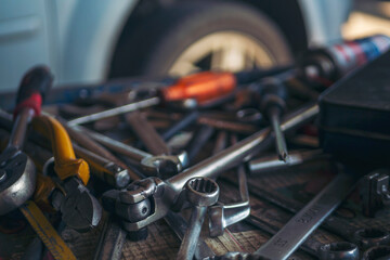 Mechanic tools engineering equipment car auto repair shop with copy space. Blurred background...