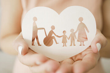 Hands holding diversity family in heart shape, happy carer and volunteer, disable nursing home,...