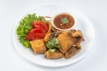 Crispy fried fish isolated on white background