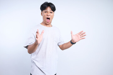 Potrait Of Excited Young Asian Guy Funny Suprised  For DIscount Sale Isolated On White Background