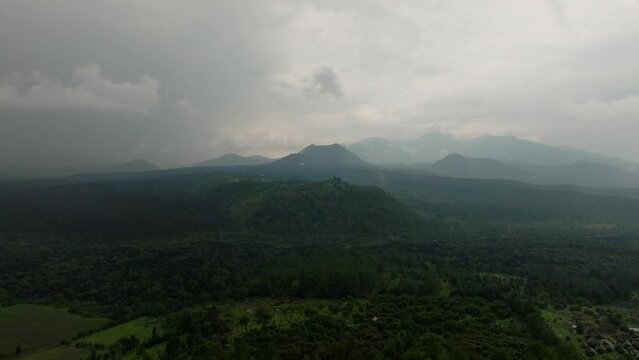 DRONE SHOT OF PARICUTIN VOLCANO ON A CLOUDY DAY 
