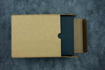 Directly above shot of open cardboard box. Shipping online box