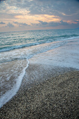 奄美、日の出、渚、波