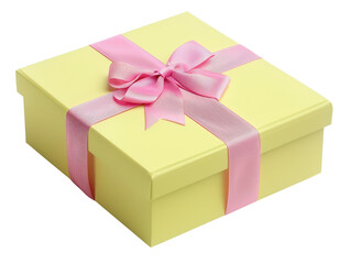 Obraz premium Yellow gift box with a pink ribbon and bow, perfect for celebrations, birthdays, and special occasions. Isolated on a white background.
