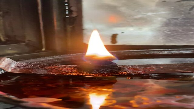 Flames under candlelight for worshiping sacred objects according to beliefs and culture in each country Region or religion, Flames under candlelight for worshiping gods, burning candle on background
