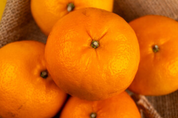 top view close up of pile of five oranges