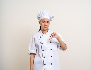 Irritable angry emotional Unhappy annoyed Young beautiful asian woman chef in uniform on isolated...