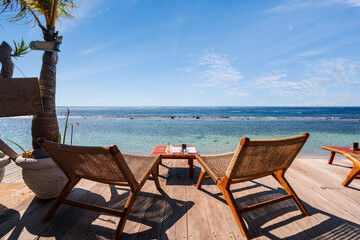 Empty beach chair with tropical beach and sea view, Summer vacation and Travel concept