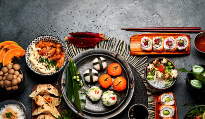 Traditional Japanese food dishes served on the table.