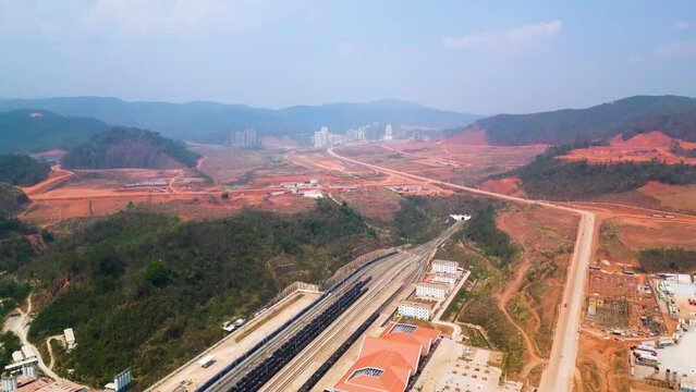Aerial shot revealing the newly constructed train station in Boten, Laos
