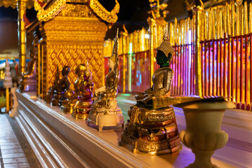 Chiang Mai, Thailand - January 8, 2022 : Wat Phra That Doi Suthep at night time is buddhist temple (wat) in Chiang Mai province. Within the site are pagodas, statues, bells, a museum, and shrines.