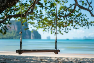 Swing hanging on the tree on the beach at Koh Samui, Thailand