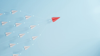 Leadership concept, red leader plane leading white plane, on blue background.