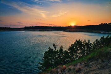 See im Abendrot - Sunset - Landscape - - Beautiful scene over the lake and silhouette hills in the background - Sunrise over sea - Colorful - Reed - Clouds - Sky - Sundown - Sun